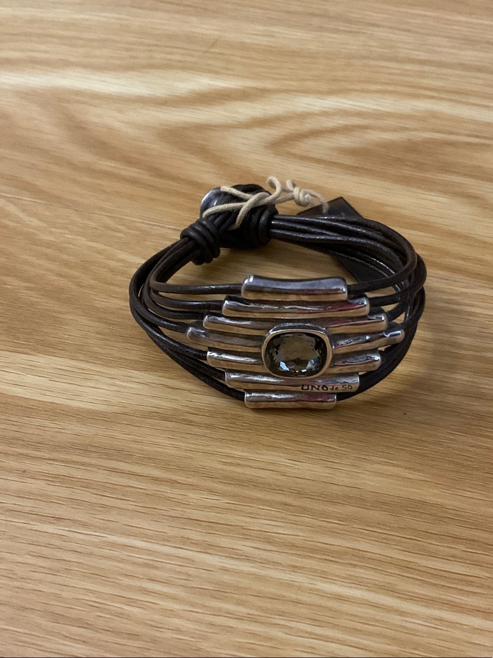 Bracelet on wooden surface